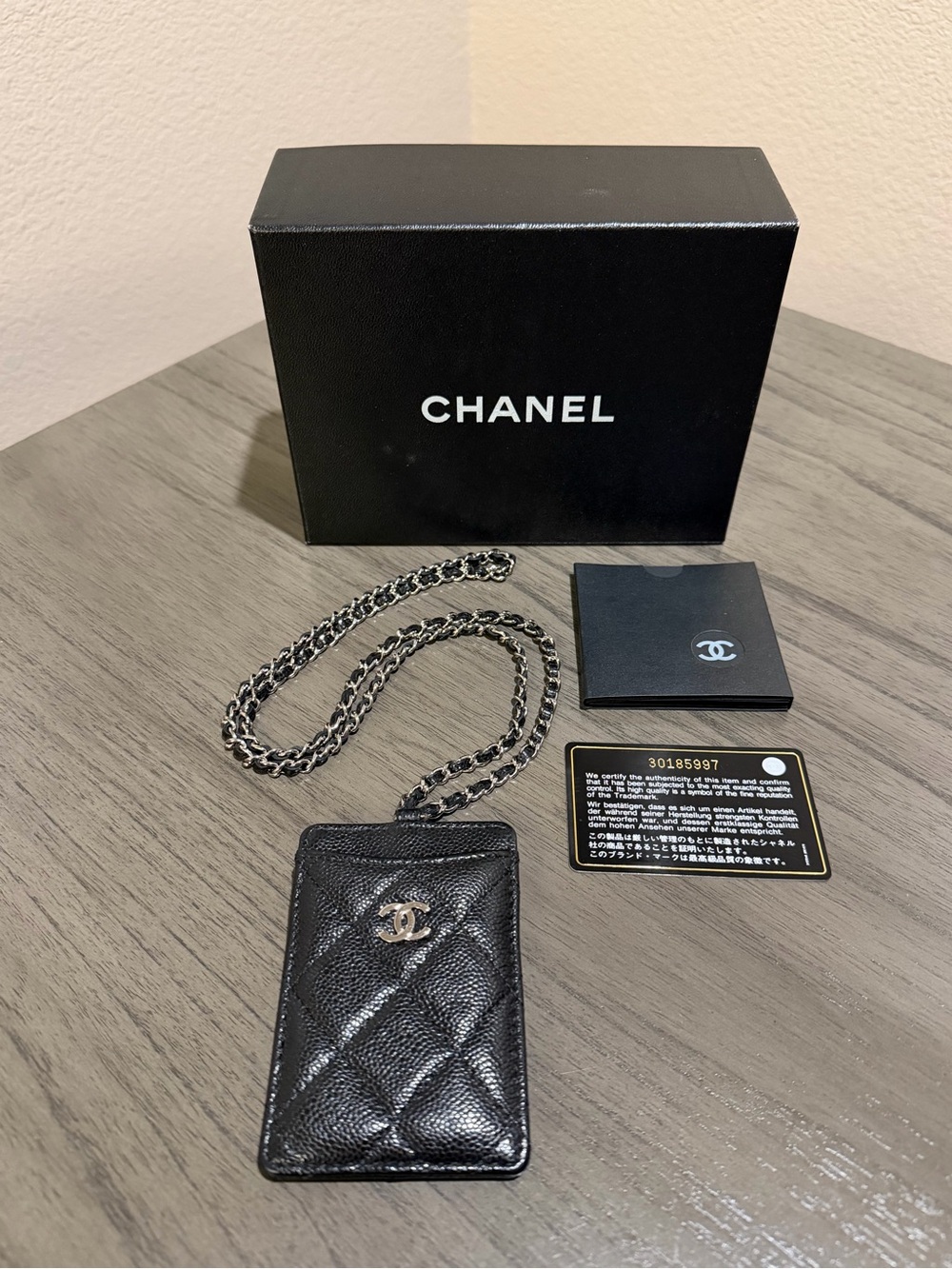 CHANEL Black Quilted Caviar Leather Cardholder on Chain with Silver CC Logo